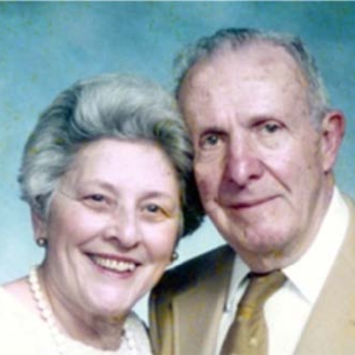 A man and woman standing next to each other.